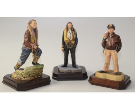 Two limited edition Ashmor Worcester porcelain Royal Airforce figures, heights 31cm and 30cm, and a Royal Navy Fleet pilot (s