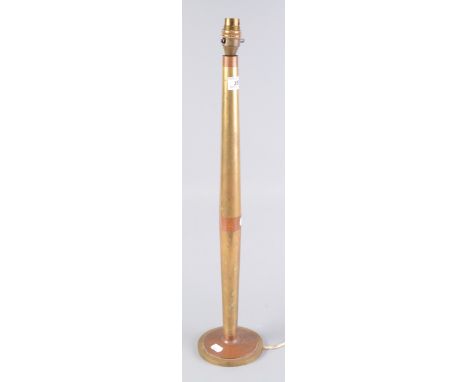 A brass and copper banded table lamp, height 62cm.   