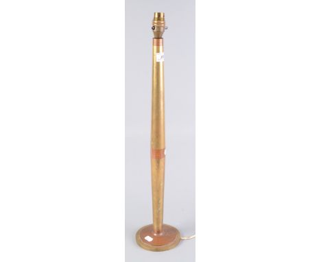 A brass and copper banded table lamp, height 62cm.   