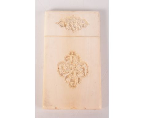 A Chinese ivory card case, 19th century, the cartouches decorated with carved figures on a balcony, 8.5 x 4.5cm.   Condition 