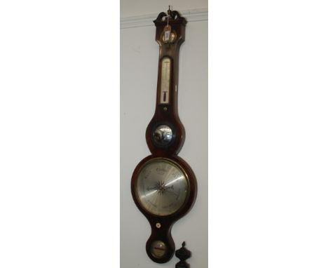 A George III inlaid mahogany wheel barometer, with three circular silvered dials, the lower inscribed 'L. Bellatti, Lincoln',
