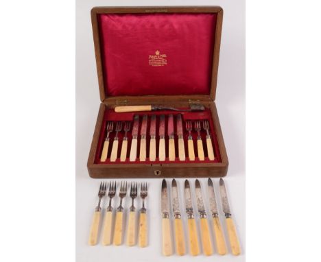 A set of six Mappin & Webb plated engraved fruit knives and forks with ivory handles, together with a matching set of six kni