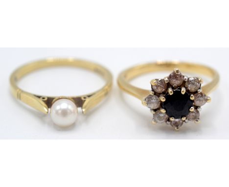 A 9ct gold cluster ring and a 9ct gold ring set a pearl. 