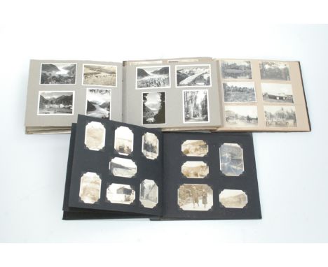 Four photograph albums and a scrapbook. 1. Wedding album, Honolulu. A scrap book charting the engagement, marriage and later 