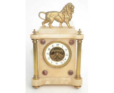 A French alabaster and gilt metal mantel clock, late 19th century, the enamel dial flanked by fluted pillars, surmounted by t