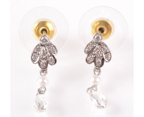 A pair of earrings, each with a diamond palmette and a drop with single pearl over a briolette diamond. 