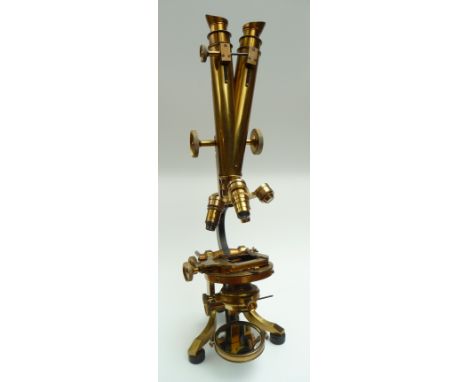 A fine binocular microscope by Watson & Sons, 313 High Holborn London 1792 (stand number), of lacquered brass with Wenham-typ