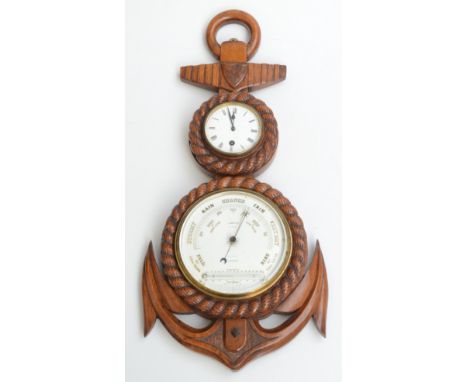 A late 19th/early 20th century clock barometer, the oak case in the form of an anchor, dial inscribed 'A Casartelli Optician,