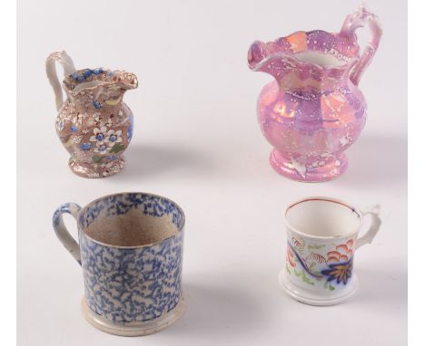 A Sunderland lustre pottery jug, height 19cm, a floral decorated jug and two mugs.