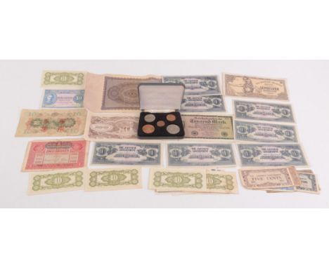 A selection of continental bank notes and two cased sets of 'Britain's First Decimal Coins'.