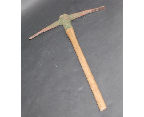 A WWII pick axe inscribed Hardy Pick Limited 1942, Sheffield, England, with wooden handle, length 83cm, width 60cm. 