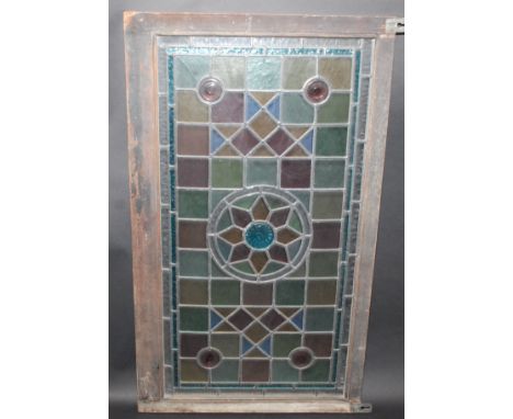 A large Victorian leaded stained glass panel, 87 x 51cm.   Condition report:  41 x 79cm in glass, 87 x 51cm in frame.