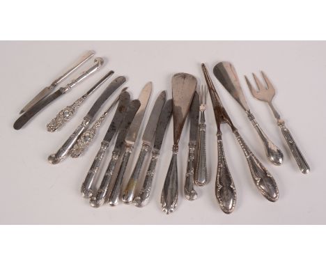 Two shoe horns, a pair of glove stretchers, and three manicure tools all with filled silver handles, together with various kn