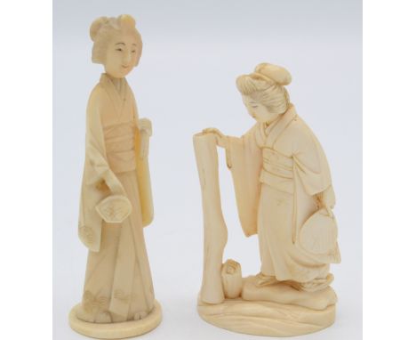 A Japanese ivory carved figure of a lady holding a fan, red character mark to base, height 7.5cm and another similar figure, 