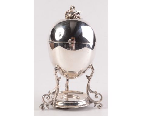 A four section egg coddler with a swan cast finial.