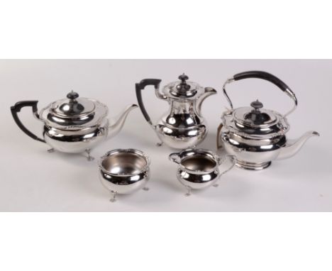 A five piece silver tea and coffee service of compressed spherical form with shaped borders by Joseph Rodgers & Sons, Sheffie