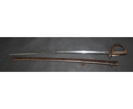 A Victorian rifle volunteer's sword with slightly curved blade and metal scabbard.