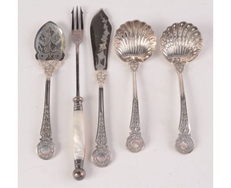 A set of four EPNS serving spoons, each with an ivy leaf cast handle and a pickle fork with a mother of pearl handle.