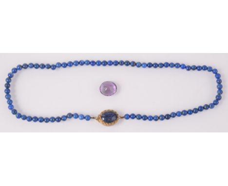 A faceted Pakistani amethyst and a lapiz lazuli necklace.