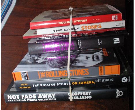 A bundle of Rolling Stones related books including "Unseen Archives" and "The Illustrated Biography".