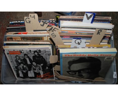 A large collection of 33rpm vinyl albums including The Buddy Holly Story on Coral, Bob Dylan, Zodiac Cosmic Sounds and The Do