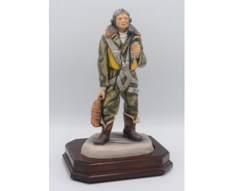 An Ashmor Worcester porcelain  figure entitled 'Royal Air Force Bomber Aircrew, model no 36, limited edition of 250, with woo