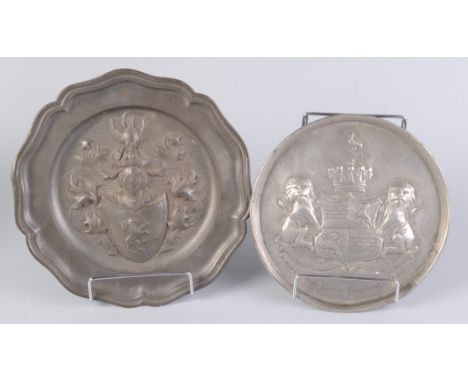 Two pewter heraldic decorated plates, the first inscribed 'James Lindsay, Earl of Cranford, b 24 Apr 1783', diameter 19.5cm.