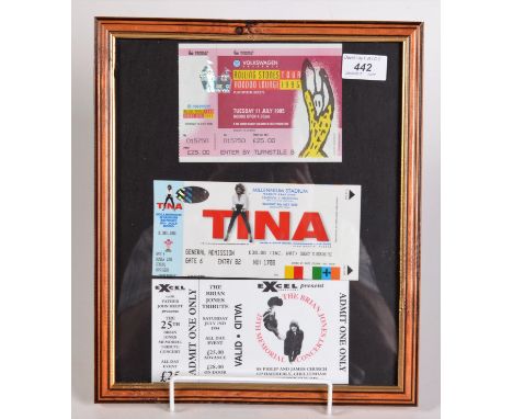 The Rolling Stones a Voodoo Lounge 1995 ticket and two others framed as one.