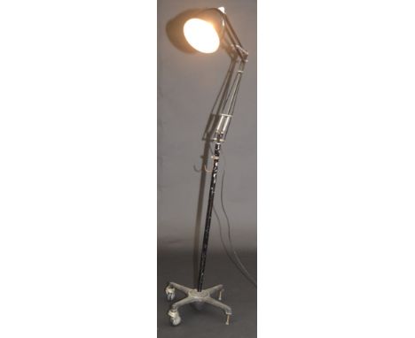 A black Anglepoise standing lamp the iron quadruple base numbered 30 L32/1, fully extended height 194cm.