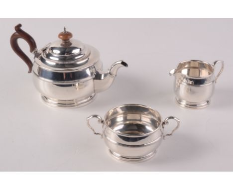 A three piece silver tea service by Mappin & Webb, Birmingham 1929. 21oz. 