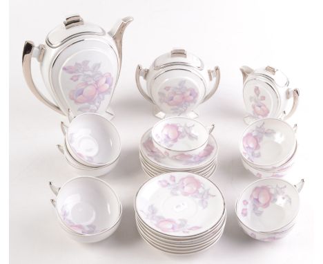 A large Limoges porcelain tea service, 'Union Porcelainiere', in the Art Deco style.    Condition report:  Commensurate with 