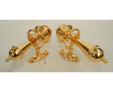 A quantity of gold plated wall lights, comprising thirty two, height 25.5cm, width 21.5cm and twenty five, height 24.5cm, wid