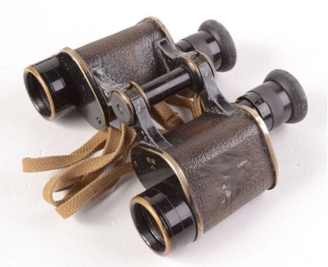 A pair of WWII binoculars by Dolland, London, Prismatic X6 No.N218 in original canvas bag, the strap inscribed 1942.