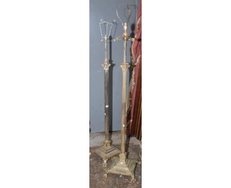 A pair of plated, height adjustable lamp standards, each made as a classical column with a Corinthian capital on a square, st