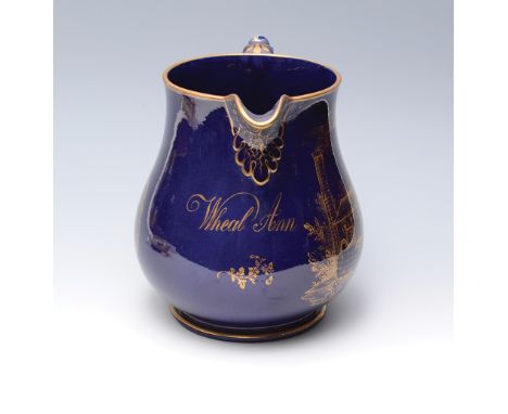 A fine and important Cornish Mining Punch Jug, from the count house of Wheal Ann. The pottery jug gilded on a deep blue groun
