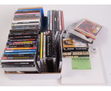 A box of Rolling Stones CDs.