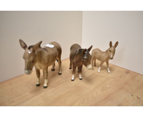 A group of three Beswick Pottery Donkey studies, comprising 'Donkey' 2267A designed by Albert Hallam and Graham Tongue in gre