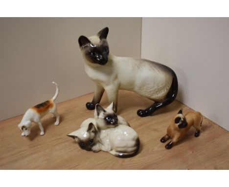 A Beswick Pottery Siamese cat study 1897 desgined by Albert Hallam in seal point gloss, 16cm sold along with Royal Doulton bo