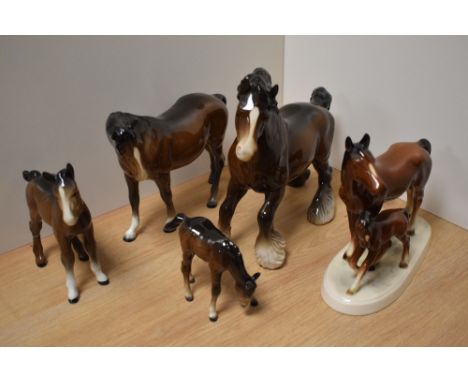 A Beswick Pottery Cantering Shire, 975 designed by Arthur Gredington in brown gloss 22cm, sold along with a Beswick Pottery m