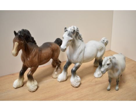 Two Beswick Pottery 'Cantering Shire' horse studies, number 975  designed by Arthur Gredington in brown and rocking horse gre