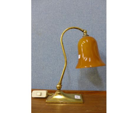 A brass desk lamp
