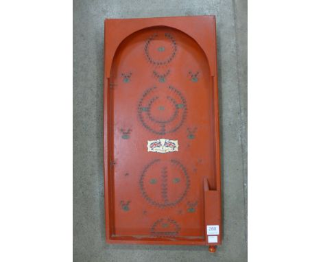 A vintage bagatelle board