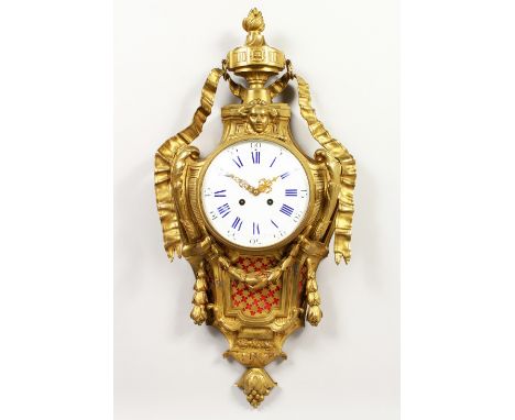 A GOOD LOUIS XVITH ORMOLU CARTEL CLOCK with seven inch blue and white enamel dial, eight day movement, in a case with urn fin