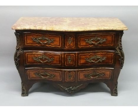 A GOOD 19TH CENTURY FRENCH KINGWOOD BOMBE COMMODE, with a marble top, two short and two long drawers, ormolu handles and moun