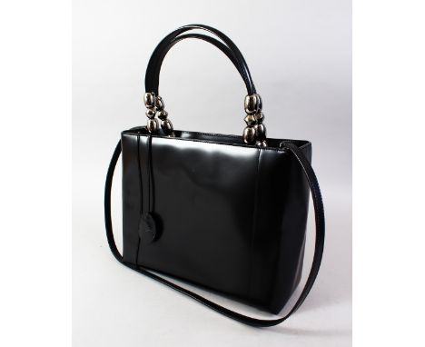 A CHRISTIAN DIOR BLACK PATENT  BAG.