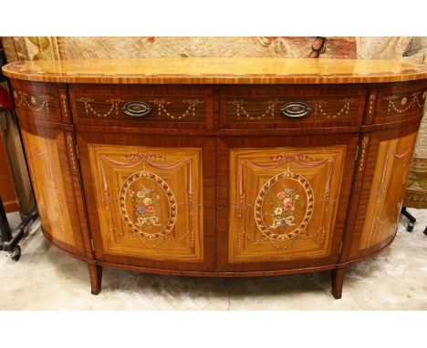 A GOOD HEPPLEWHITE REVIVAL SATINWOOD, MAHOGANY AND ROSEWOOD BOWFRONT COMMODE, profusely painted with musical trophies, harebe