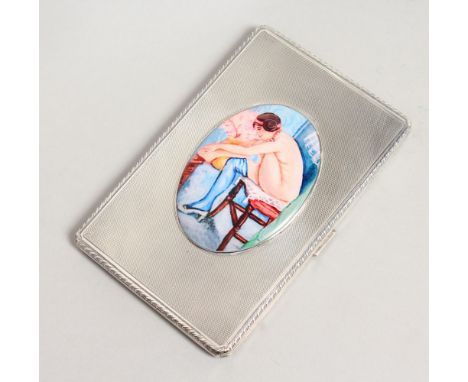 AN ENGINE TURNED CIGARETTE CASE. London 1931 with an erotic enamel.