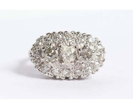 A 14CT GOLD DIAMOND RING.