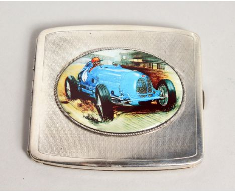 AN ENGINE TURNED CIGARETTE CASE with an enamel of a racing car.
