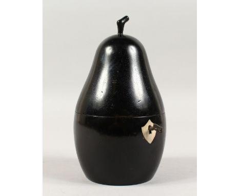 AN EBONISED PEAR SHAPED TEA CADDY. 7ins high.